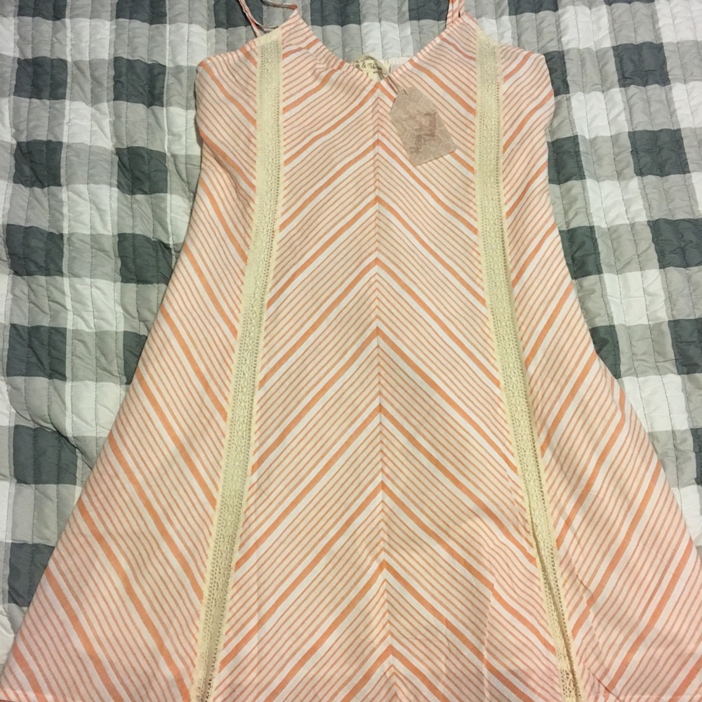 White & orange dress with lace detail